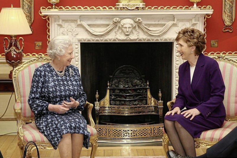 Britain&#39;s Queen Elizabeth II (left) talks with Irish President Mary McAleese at Hillsborough Castle Belfast Thursday December 8 2005. It is the Queen&#39;s first visit to Northern Ireland since February 2003. See PA story ROYAL Ulster. PRESS ASSOCIATION Photo. Photo credit should read: Niall Carson/Pool/PA 
