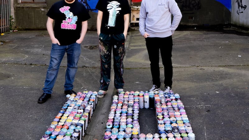 Pictured launching the 2023 Hit The North Street Art Festival is Adam Turkington, Director of Seedhead Arts, street artist Peachzz and Jamie Jamison from Hennessy