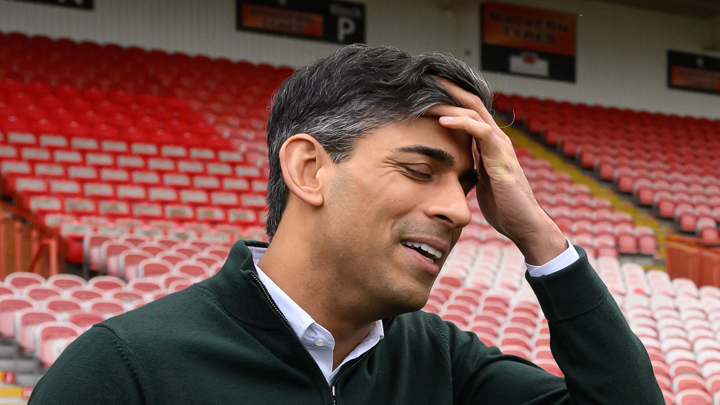 Prime Minister Rishi Sunak speaks with second team players during a visit to Gloucester Rugby Club in Kingsholm, Gloucestershire