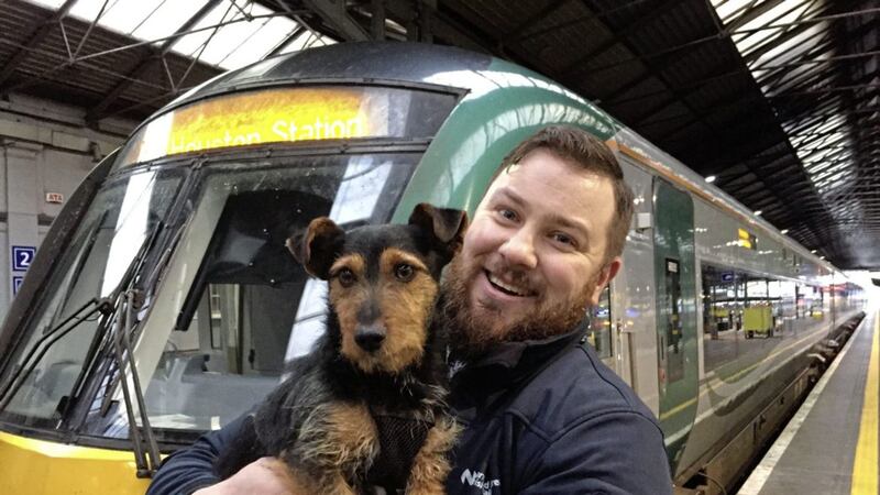 Irish rail worker Ted Maher with intrepid travelling dog &#39;Hamish&#39; who boarded a commuter train in Co Kildare and ended up at Dublin&#39;s Heuston Station. Picture by David Young/PA 