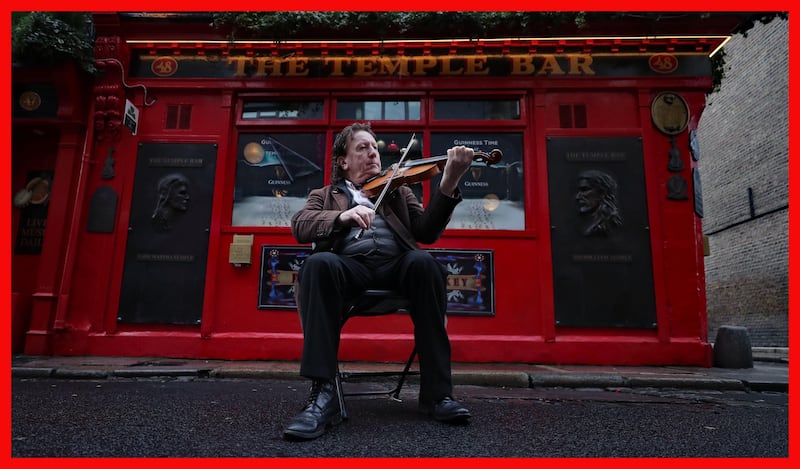 PABest

World renowned fiddler Frankie Gavin performs a lament marking exactly 1 year to the day that Dublin's Temple Bar Area closed down. Picture date: Monday March 15, 2021. PA Photo. See PA story IRISH Coronavirus Bars. Photo credit should read: Niall Carson/PA Wire