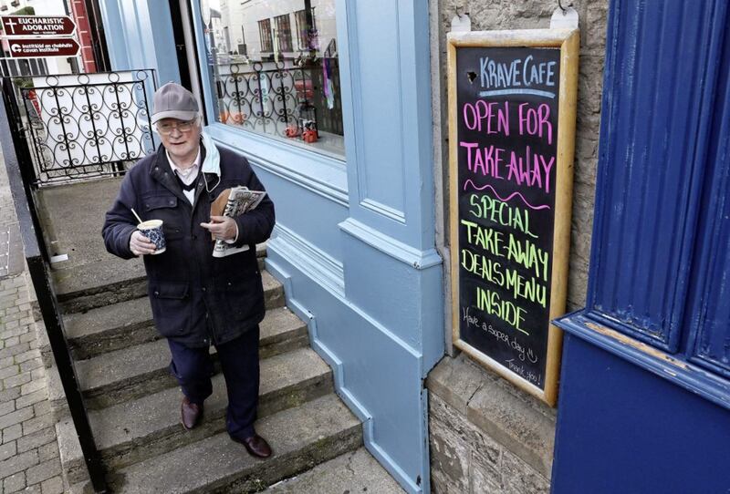 Brian Morrow leaves Krave Cafe on Main Street, Cavan as counties Donegal, Cavan and Monaghan prepared to move to Level 4 of the Republic's Covid-19 plan last week. The whole country has now moved to the even tougher Level 5. Picture by Brian Lawless/PA Wire