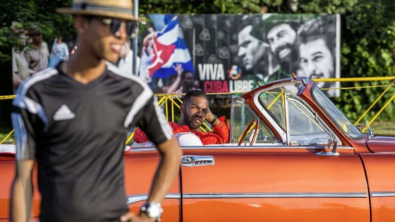 Drivers wait for tourists, in vintage American convertibles at Revolution Square in Havana. Picture by Desmond Boylan, Associated Press
