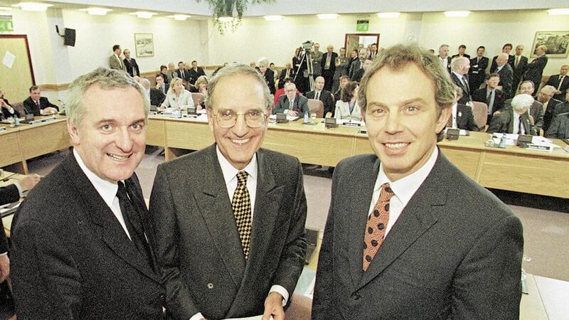 Pictured at the signing of the Good Friday Agreement in 1998 are Tony Blair, Senator George Mitchell and Bertie Ahern 