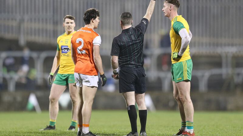 Jason McGee (Donegal) and James Morgan (Armagh) are red-carded during Saturday evening's League clash Picture by Margaret McLaughlin