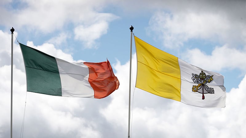 The Irish and Papal flags flying at Knock Shrine in Co Mayo, where Pope Francis will visit later this month. Picture by Niall Carson, Press Association