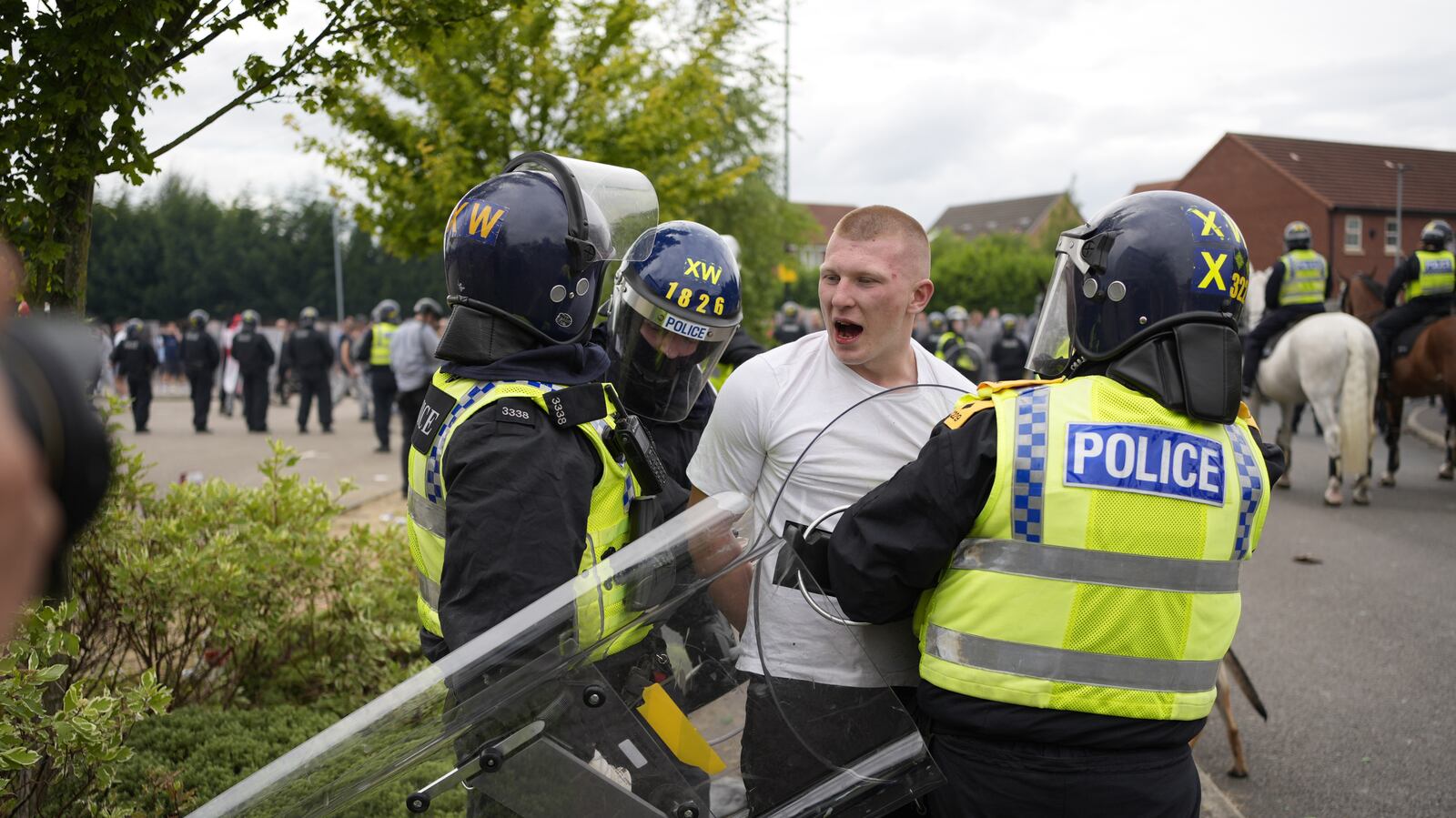 Riot Engineer Engineer jailed for charging at riot police who were guarding hotel ...