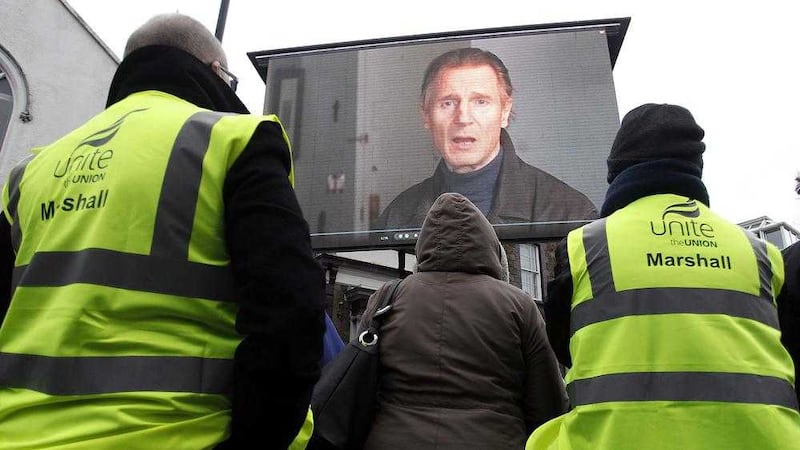 Ballymena native and Hollywood actor Liam Neeson delivers a video message to the crowd calling for investment in manufacturing jobs. Picture by Aidan O&#39;Reilly/Pacemaker Press 