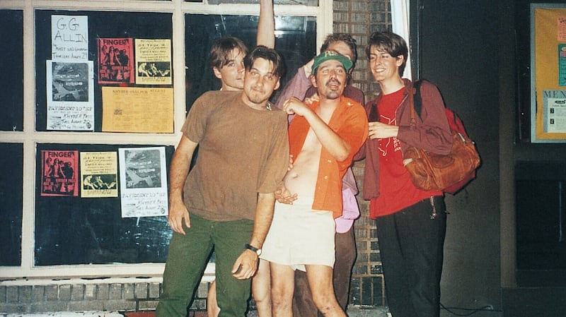 A photo of the indie rock band Pavement in their early years when Gary Young was their drummer