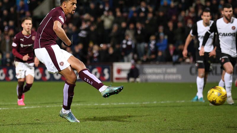 Heart's Osman Sow scores his side's third goal from the penalty spot at Tynecastle on Wednesday night<br />Picture by PA&nbsp;