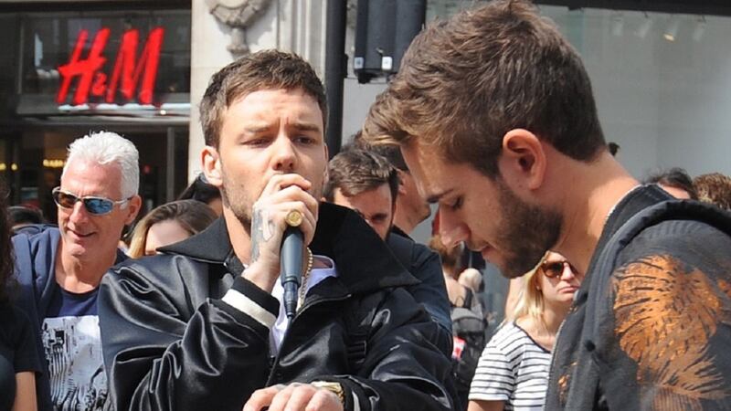 Fans of the One Direction star were treated to two impromptu performances in London.