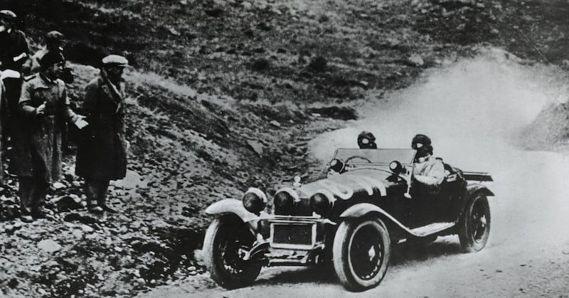 Tazio Nuvolari and Gian Battista Guidotti raising dust on their way to a famous Mille Miglia win in 1930 in their Alfa Romeo 6C 1750 Gran-Sport