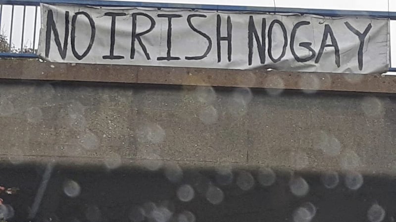 The banner was placed on a bridge over the M1 motorway between junctions nine and 10 and has been condemned by a politician as &quot;despicable&quot; 