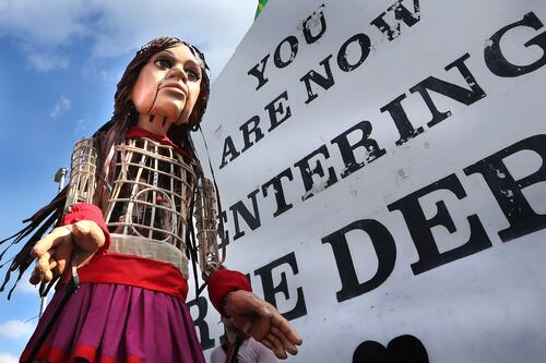 Crowds join Little Amal as giant refugee puppet visits Derry