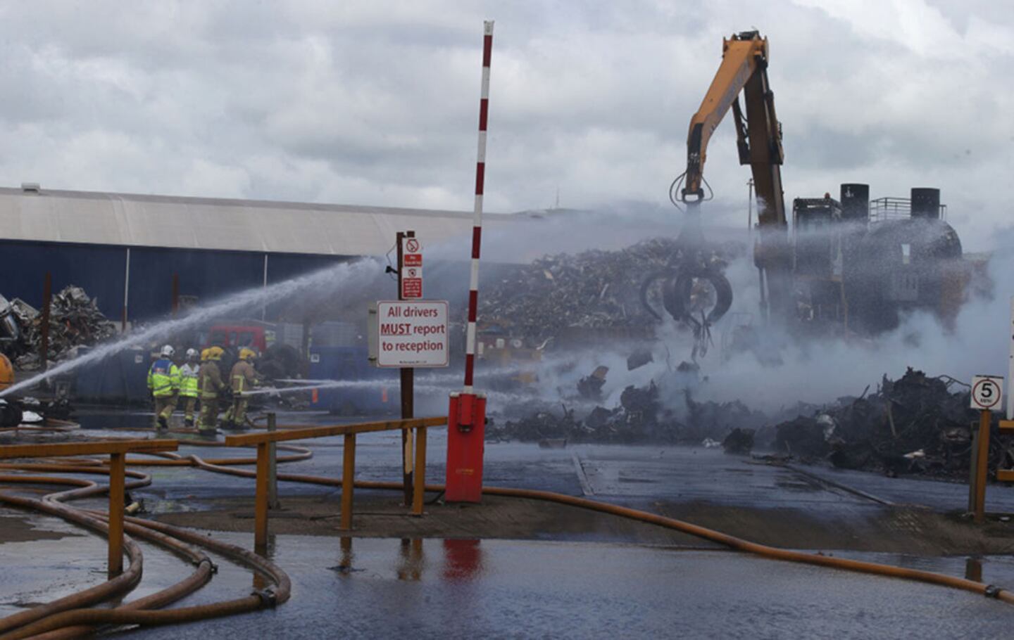 Firefighters bring blaze at north Belfast scrap metal yard under ...