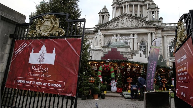 The OutsideIn stall at the Belfast Christmas Market has vowed to continue to operate despite being targeted in a robbery on Thursday. Picture by Hugh Russell 