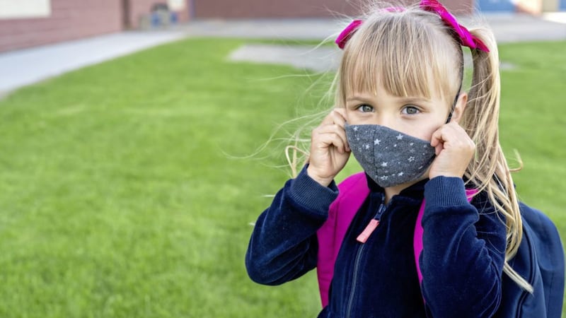 Children entitled to free home-to-school transport will be given reusable masks 