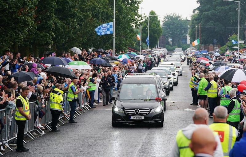 Christy Dignam's funeral as it passed through Finglas in Dublin