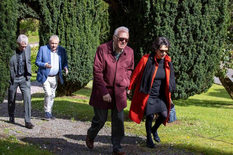 (from left) Journalists Joel Taggart, Chris Moore, Noel Thompson, and Maggie Taggert attend the funeral of former BBC Northern Ireland political editor Stephen Grimason at Drumbeg Parish Church.