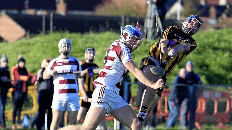 Slaughtneil&#39;s Shane McGuigan and Ballycran&#39;s Conor Woods clash in yesterday&#39;s Ulster semi-final. Pic Philip Walsh 