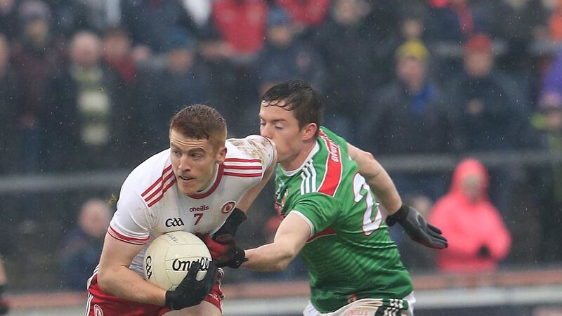 Tyrone's Peter Harte up against Stephen Coen of Mayo.&nbsp;