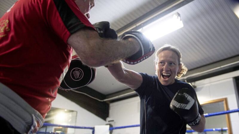 Professional boxer Cathy McAleer with her coach John Breen at Breen&#39;s Gym, Belfast. Picture by Mark Marlow 