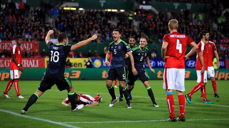 Wales players mates celebrate after Austria&rsquo;s Kevin Wimmer&rsquo;s own goal in the sides&rsquo; 2-2 World Cup qualifier draw in Vienna on Thursday
