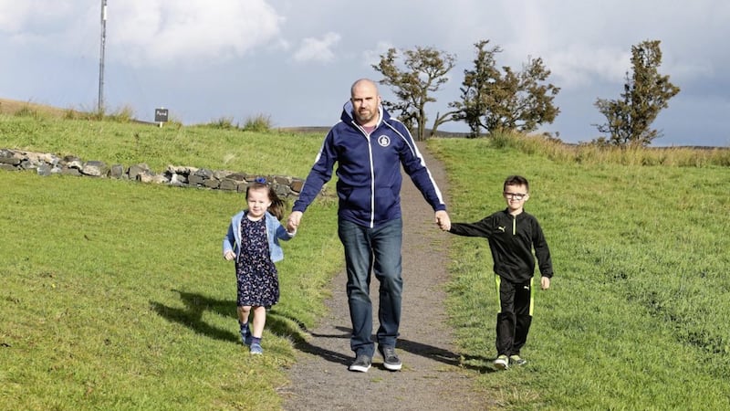 West Belfast father-of two Gerard Curley, seen with his children Aodh&aacute;n and &Eacute;abha, founded True Dad Tribe for men keen to improve their parenting skills and mental health well-being. Picture by Mal McCann
