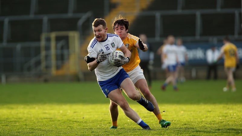 Monaghan's   Barry McGinn   and     Antrim's   Patrick Finnegan       in  action   in yesterday's   Dr McKenna Cup  game  at Clones. Picture by Seamus Loughran.&nbsp;