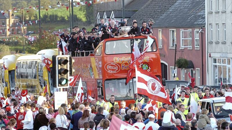 Tyrone bring Sam Maguire across the border into Aughnacloy following their 2008 All-Ireland success. Pic Cliff Donaldson 