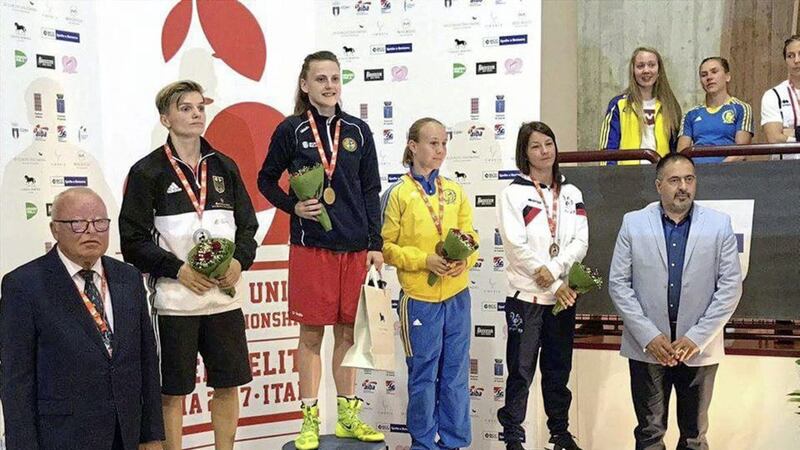 Belfast bantam Michael Walsh stands proudly on top of the podium after winning gold at the EU Championships on Saturday 
