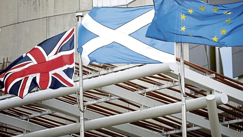 Union, Saltire and European flag flying outside the Scottish parliament in Edinburgh PICTURE: Jane Barlow/PA 