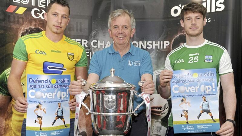 Gerry McElwee of Cancer Focus NI (centre) pictured with Paul Brennan of Donegal (left) and Fermanagh player Tom&aacute;s Corrigan 