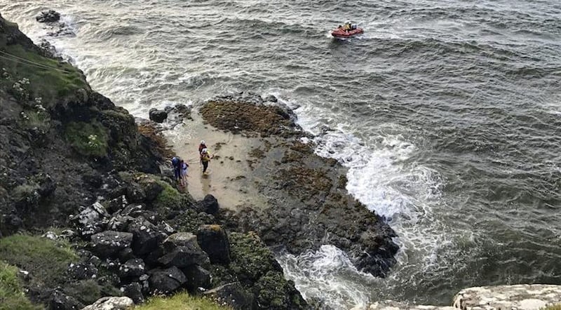 A lifeguard and one crew member from the Inshore Lifeboat landed on the rocks. Picture by Coleraine Coastguard 