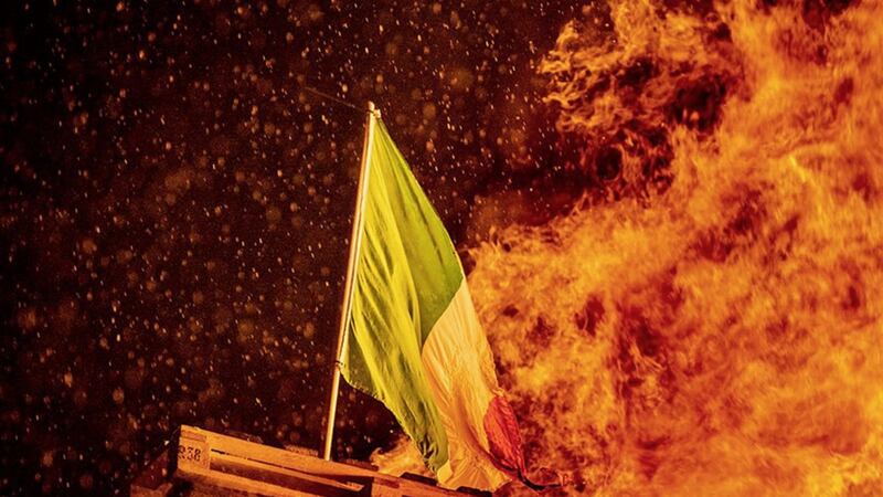 A tricolour burns on a bonfire in Tiger&#39;s Bay in north Belfast earlier this year. Picture by Liam McBurney/PA Wire 