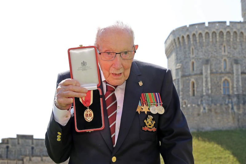 Sir Tom after receiving his knighthood from the Queen