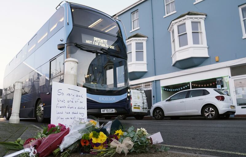 Flowers were left at the entrance at Portland Port in Dorset, following the death