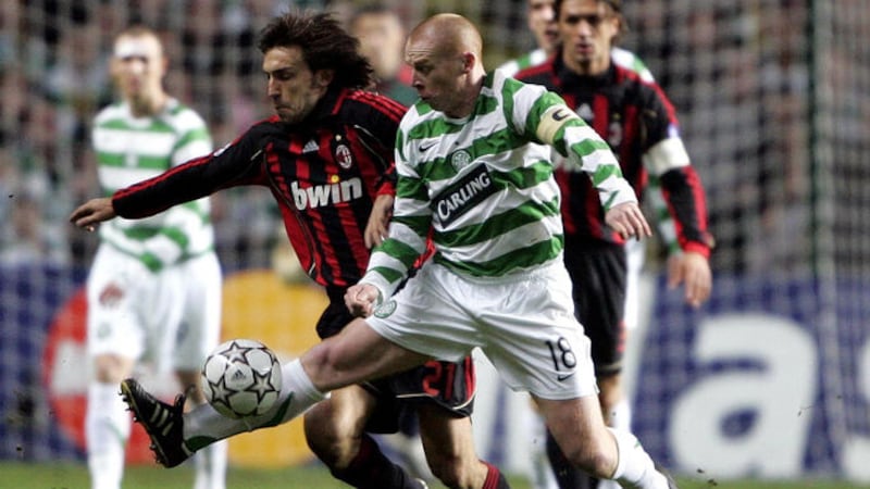 Celtic's Neil Lennon challenges AC Milan's Andrea Pirlo during the Champions League first knockout round first leg match at Celtic Park Glasgow in 2007