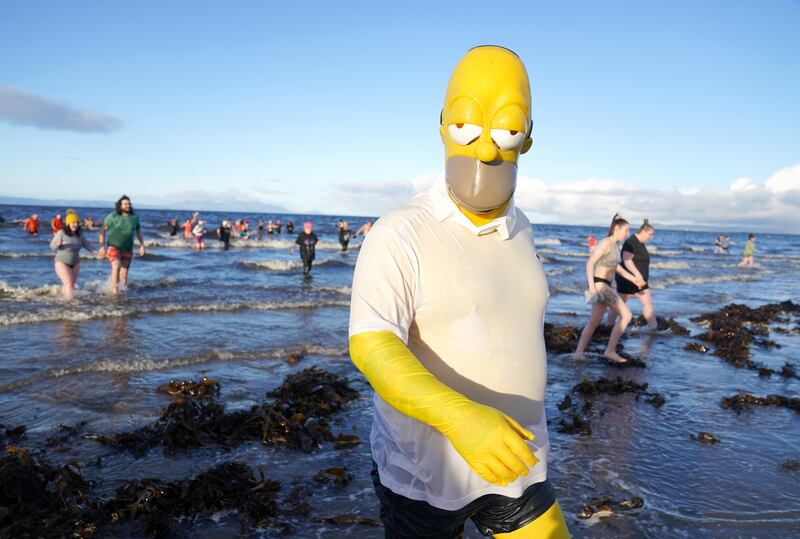 Swimmers dressed up for the Ayrshire Cancer Support Boxing Day Dip at Ayr Beach