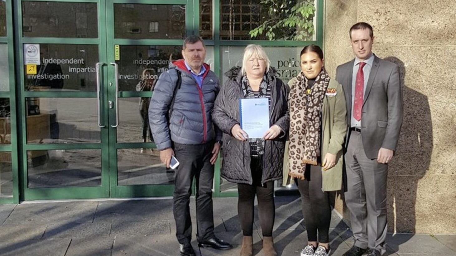 John Hemsworth's widow Colette and daughter Danielle pictured with Relatives For Justice director Mark Thompson and solicitor Raymond Hughes outside the Police Ombudsman's office yesterday