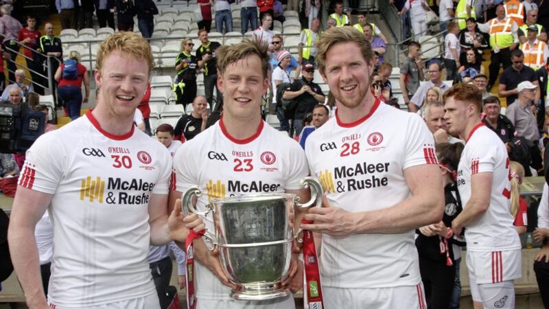 Pomeroy trio Hugh Pat McGeary, Kieran McGeary and Frank Burns with the Anglo-Celt Cup last year. 