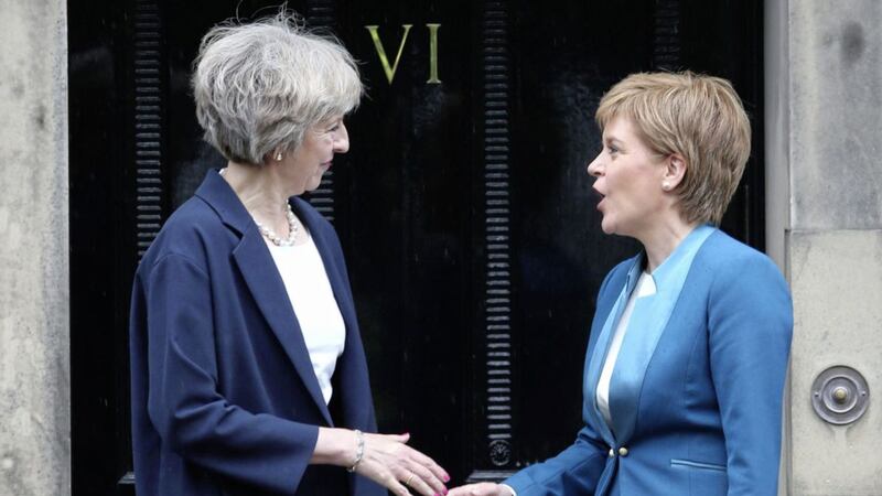 Theresa May, left, meets Nicola Sturgeon at Bute House in Edinburgh last year. Picture by Andrew Milligan, Press Association 