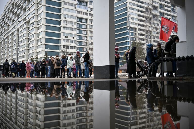 Voters queue at a polling station in Moscow, Russia on March 17 (AP Images)