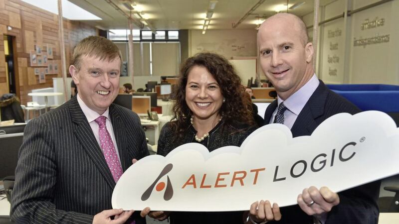 Former Finance Minister Mervyn Storey with Kimberley Bowron and Gray Hall of Alert Logic during the firm&#39;s February 2016 jobs announcement 