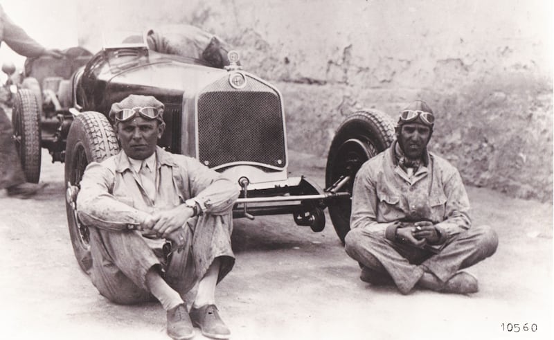 The two protagonists in the 1930 Mille Miglia Achille Varzi, pictured left, and Tazio Nuvolari. They are pictured in front of an Alfa Romeo 6C 1750, the era's dominant sports car