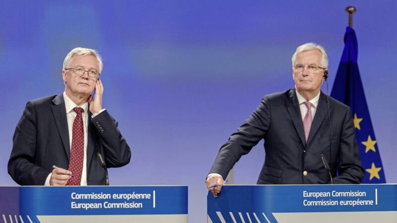 EU chief Brexit negotiator Michel Barnier, right, and British Secretary of State David Davis after a week of talks in Brussels. Picture by Geert Vanden Wijngaert, Associated Press 