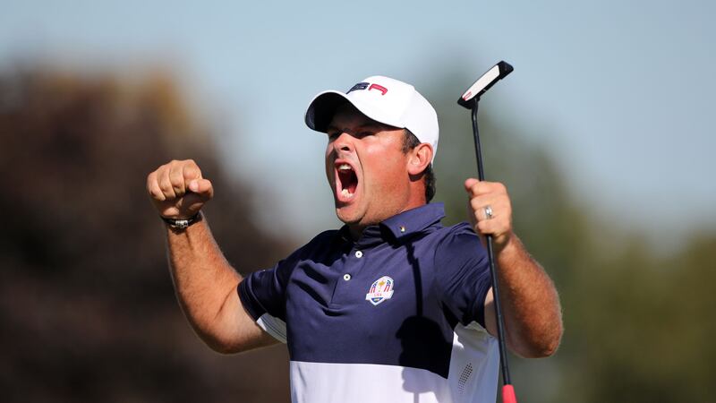 &nbsp;USA's Patrick Reed celebrates winning his round during the singles matches on day three of the 41st Ryder Cup at Hazeltine National Golf Club in Chaska, Minnesota.