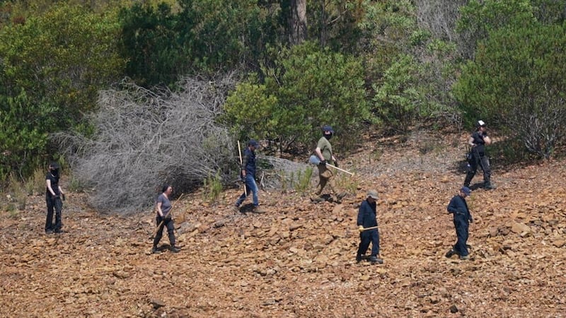 Personnel at Barragem do Arade reservoir, in the Algave, Portugal, as searches continue as part of the investigation into the disappearance of Madeleine McCann (Yui Mok/PA)