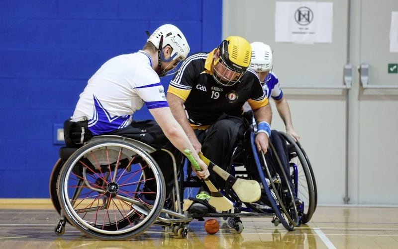 Peadar Heffron of Ulster in action against Aidan Hynes, left, and Peter Egan of Connacht during the GAA Wheelchair Hurling All-Ireland Finals