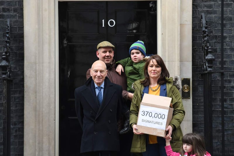 Alfie Dingley, his sister Annie, parents Drew Dingley and Hannah Deacon and actor Sir Patrick Stewart at 10 Downing Street (Stefan Rousseau/PA)